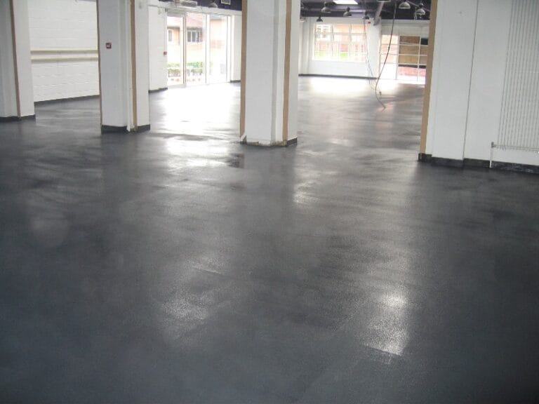 Cafeteria floor primed with Achtis EP 70 basecoat during preparation phase