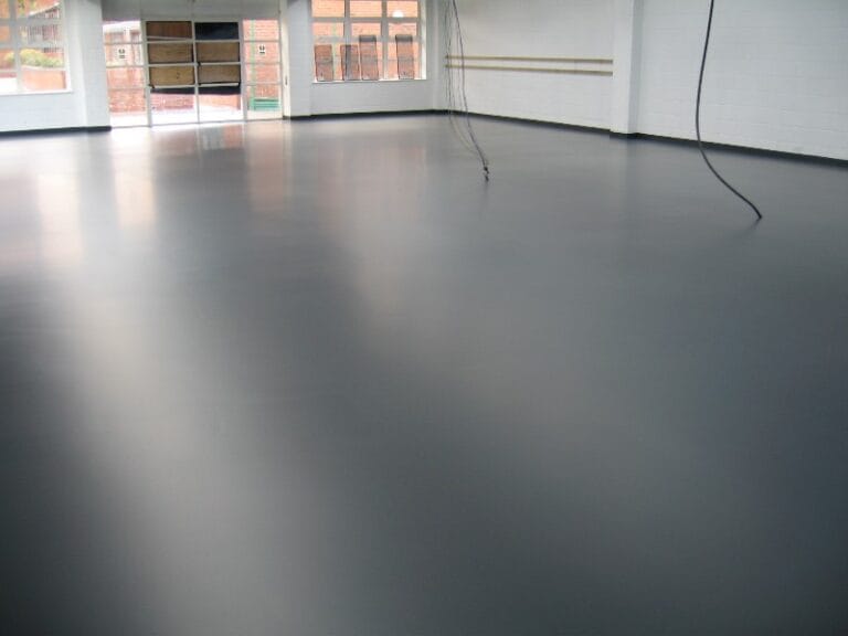 Dark sealed cafeteria floor with Achtis APU 46 protective coating