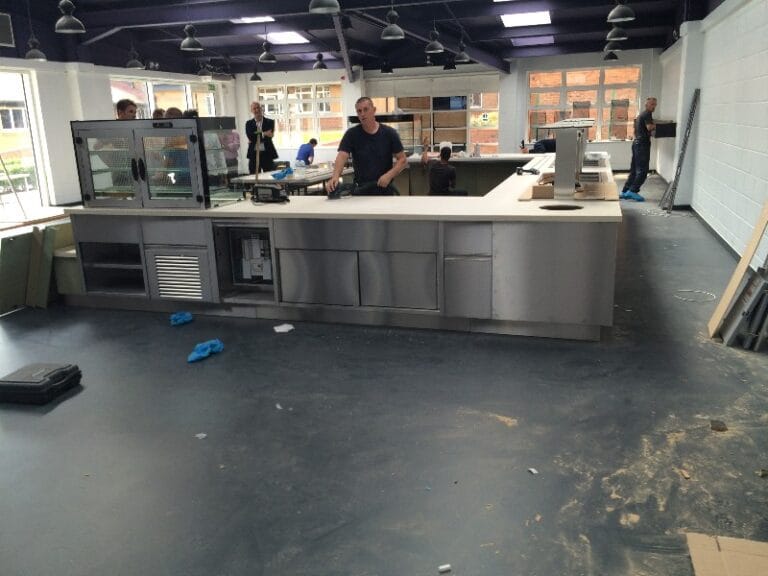 Sealed cafeteria floor two days after sealer application, showing an even finish