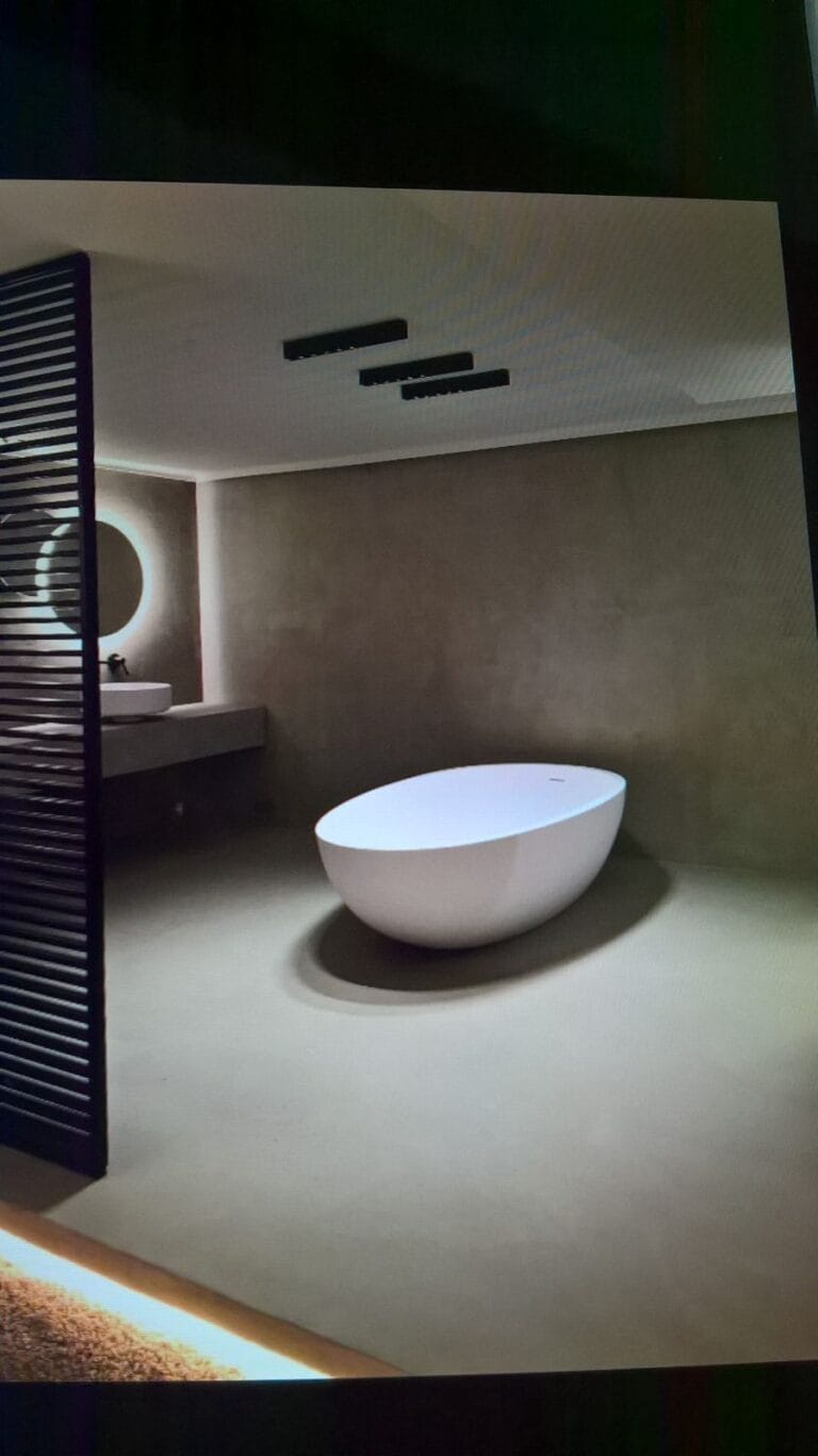Contemporary bathroom with freestanding bath in Concrete Grey Politura Microcement