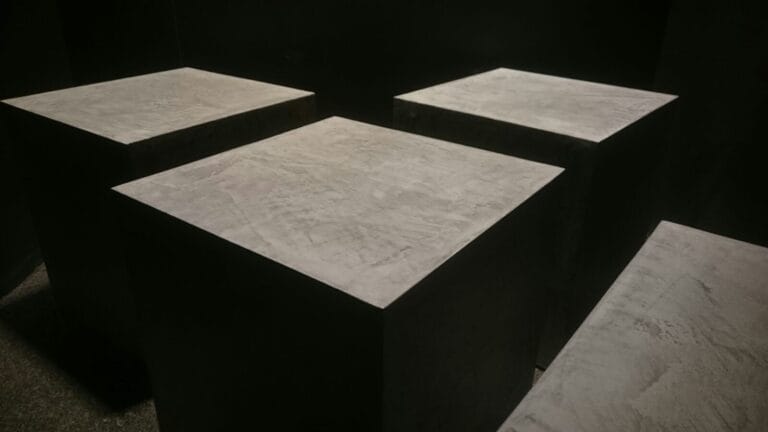 Politura Microcement display samples on exhibition pedestals