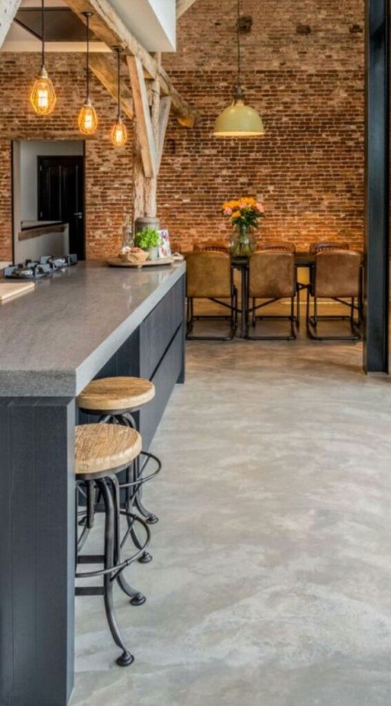 Kitchen dining room with Politura microcment floor in Concrete Grey with Cloudy Effect