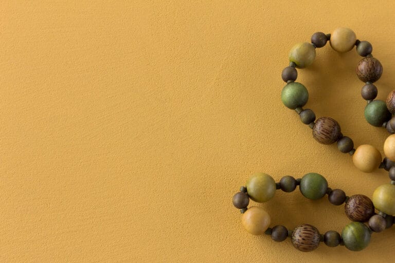 ErreLAB ErreFAST golden-yellow resin with decorative beaded pattern detail