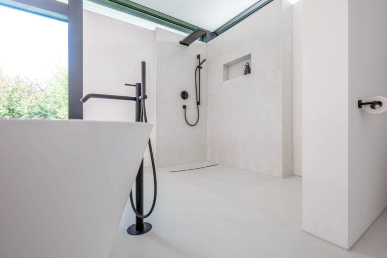 ErreLAB Pietra Continua Basalto walk-in shower and floor, wide-angle view
