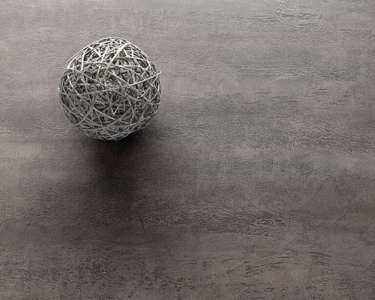 ErreLAB Pietra Continua Porfido in dark charcoal with woven wire ball