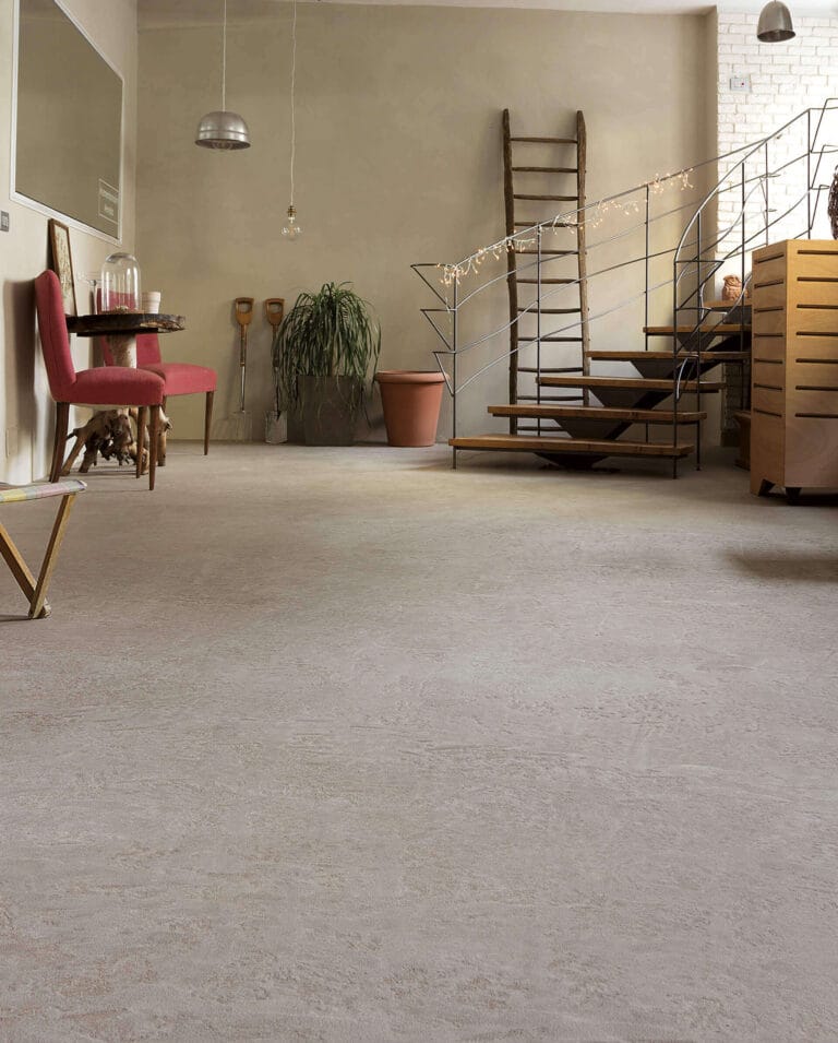 Modern interior space with ErreLAB Pietra Continua Travertino finish flooring and furnishings