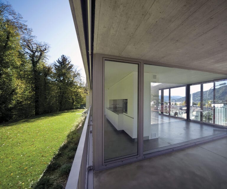 ErreLAB Spatolato Outdoor patio overlooking manicured lawn and countryside