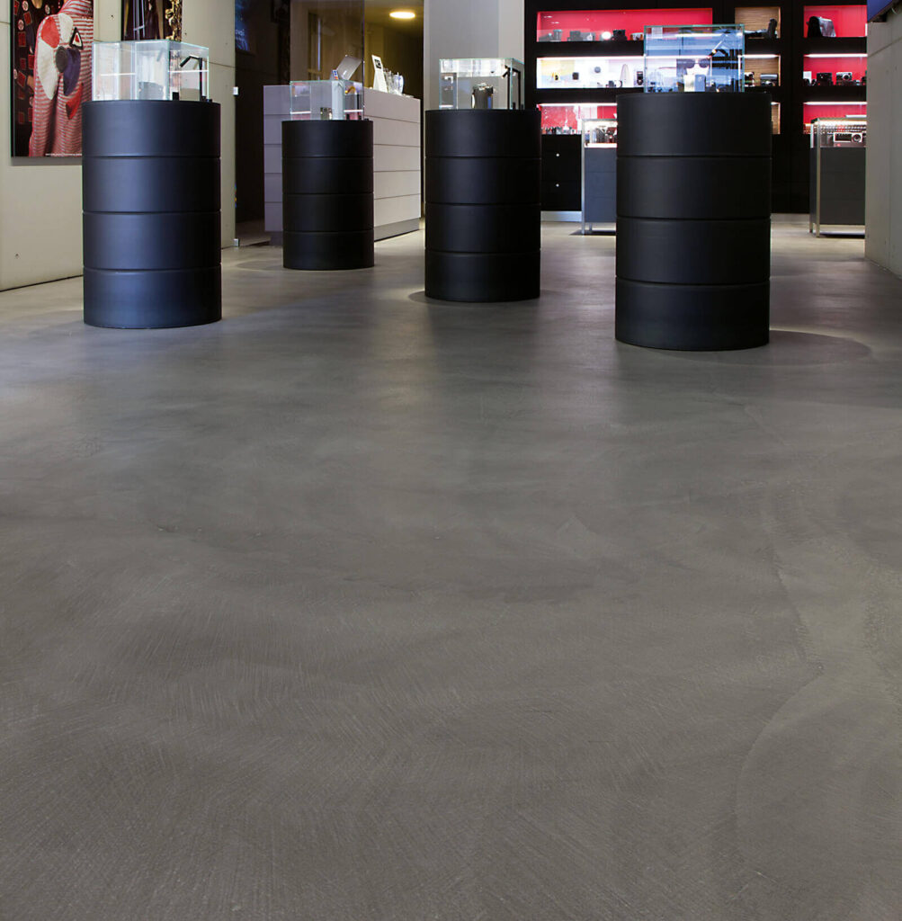 Errelab Velato resin based microcement finish to store floor
