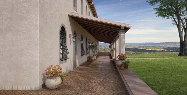 Rialto Epoca Marmo white finish on modern building exterior with covered walkway and rural landscape