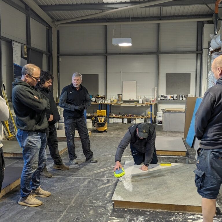 Practical training session demonstrating professional coating application methods