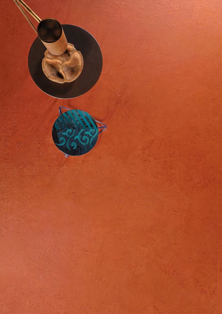 ErreLAB Metallo Continuo floor in copper, seen from above with side tables